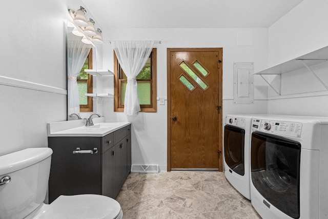 1037 S Union St, Shawano, WI 54166 - washroom featuring electric panel and washer and clothes dryer