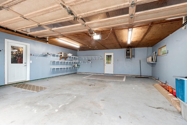 1037 S Union St, Shawano, WI 54166 - garage featuring a garage door opener