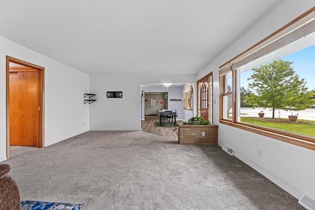 1037 S Union St, Shawano, WI 54166 - carpeted living room featuring baseboards