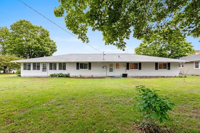 1037 S Union St, Shawano, WI 54166 - rear view of property with a lawn and cooling unit