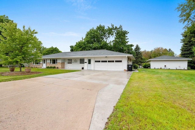 1037 S Union St, Shawano, WI 54166 - single story home featuring a garage, driveway, and a front yard