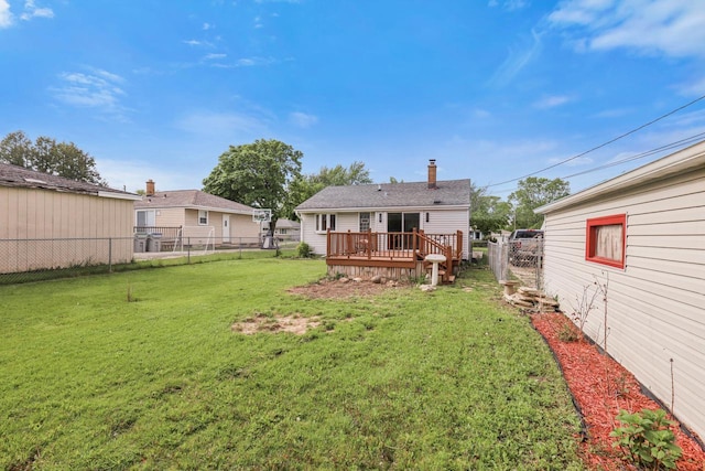 8721 W Douglas Ave, Milwaukee, WI 53225 - back of house featuring a wooden deck and a chimney