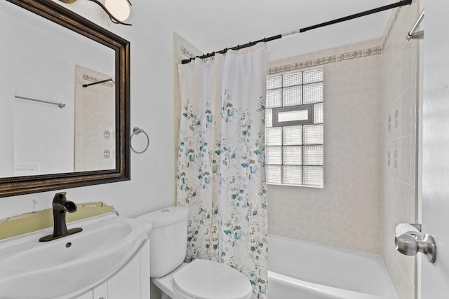 8721 W Douglas Ave, Milwaukee, WI 53225 - bathroom featuring vanity, shower / bath combo, and toilet