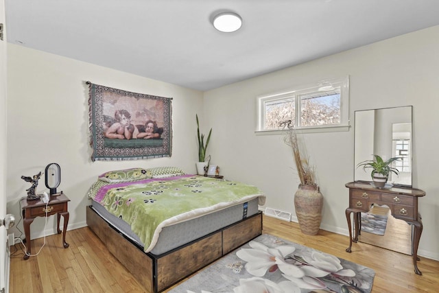 8721 W Douglas Ave, Milwaukee, WI 53225 - bedroom with wood finished floors and baseboards