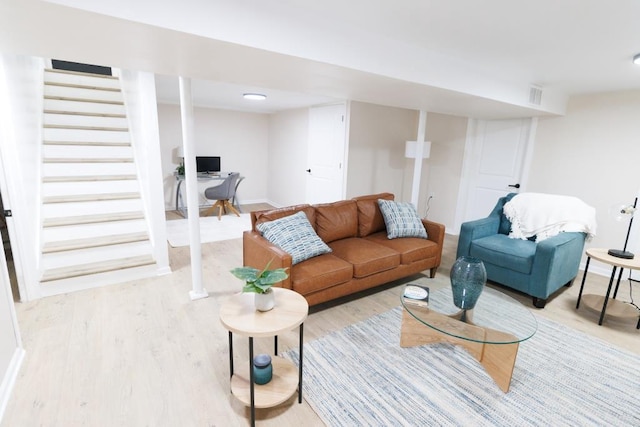9533 W Silver Spring Dr, Milwaukee, WI 53225 - living room featuring wood finished floors, stairway, and baseboards