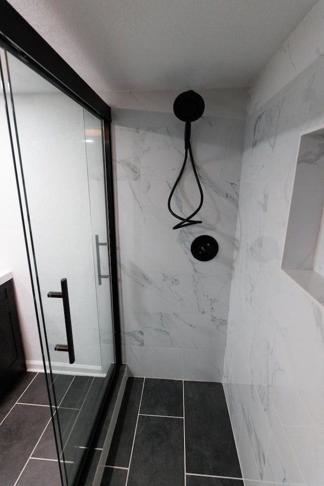 9533 W Silver Spring Dr, Milwaukee, WI 53225 - full bath with a marble finish shower, tile patterned floors, and vanity