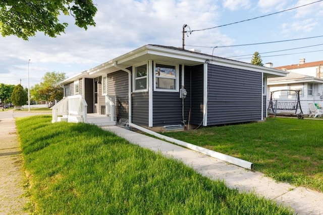 9533 W Silver Spring Dr, Milwaukee, WI 53225 - view of front facade with a front yard
