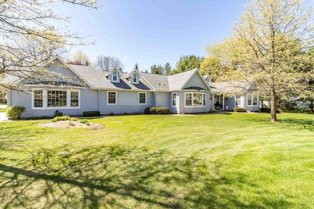 3810 Timber Valley Dr, Wisconsin Rapids, WI 54494 - rear view of property featuring a yard