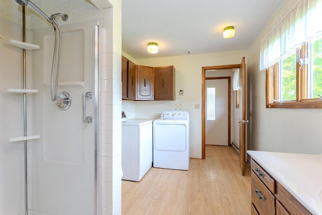 419 E Beech St, Edgar, WI 54426 - laundry area with washer and dryer and light wood-style floors