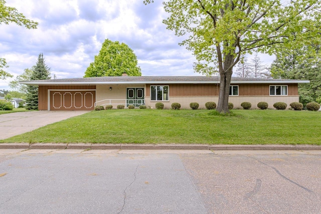 419 E Beech St, Edgar, WI 54426 - ranch-style house featuring a garage, driveway, and a front lawn