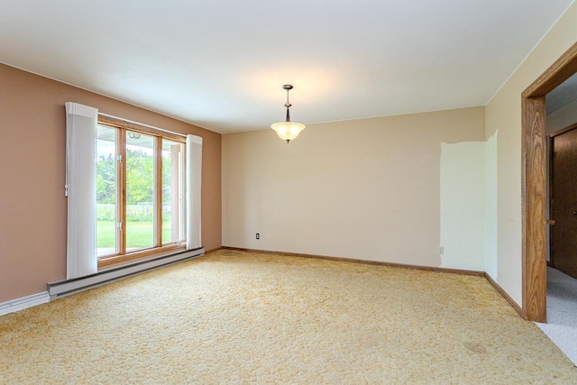 419 E Beech St, Edgar, WI 54426 - carpeted spare room with baseboards and baseboard heating
