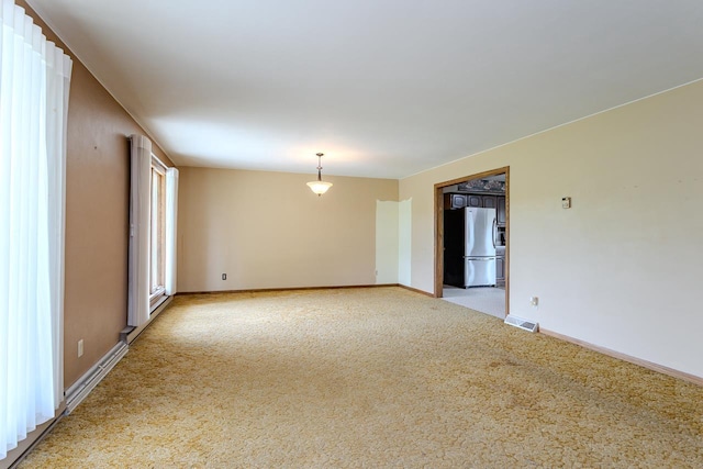 419 E Beech St, Edgar, WI 54426 - unfurnished room with light colored carpet and baseboards