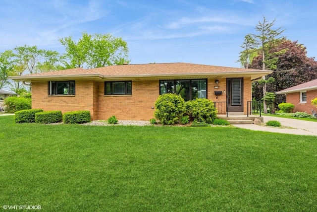 2590 S 91st St, West Allis, WI 53227 - ranch-style house featuring a front lawn and brick siding