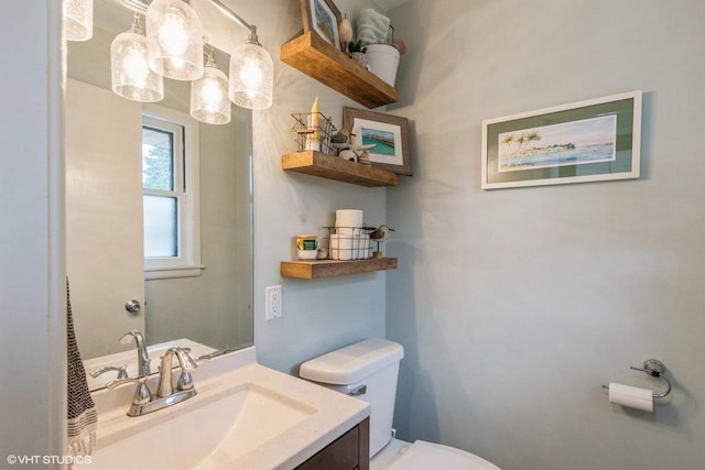 2590 S 91st St, West Allis, WI 53227 - half bath featuring toilet and vanity
