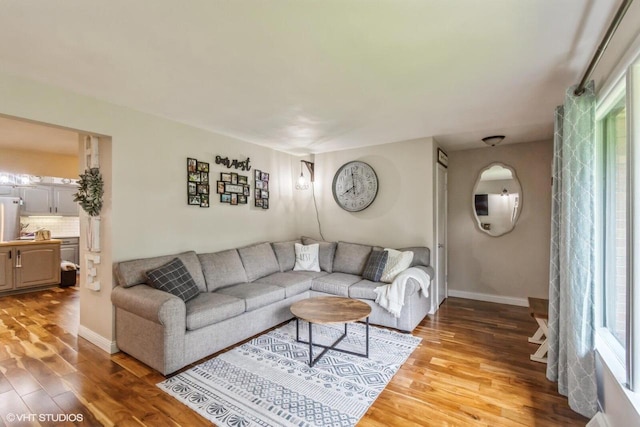 2590 S 91st St, West Allis, WI 53227 - living room with light wood-type flooring and baseboards