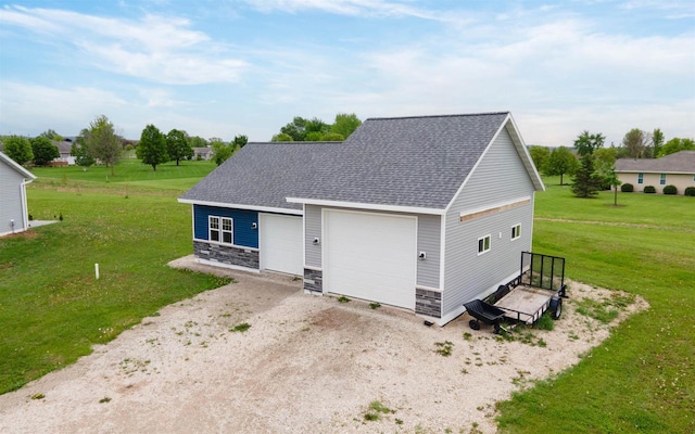 3815 Stone Wall Dr, De Pere, WI 54115 - view of front of property with a front yard, a detached garage, roof with shingles, and stone siding