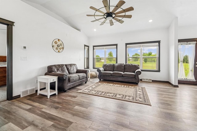 3815 Stone Wall Dr, De Pere, WI 54115 - living room with ceiling fan, lofted ceiling, wood finished floors, baseboards, and recessed lighting