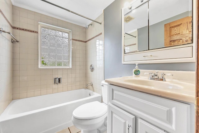 1945 Eastman Ave, Green Bay, WI 54302 - bathroom with toilet, vanity, and bathtub / shower combination