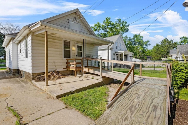 310 W Edgewater St, Portage, WI 53901 - view of front of house with a porch