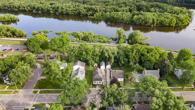 310 W Edgewater St, Portage, WI 53901 - aerial view of property's location featuring a nearby body of water and a heavily wooded area