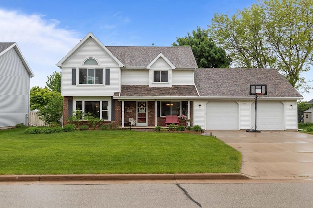 2305 W Twin Willows Dr, Appleton, WI 54914 - traditional-style home featuring an attached garage, a porch, driveway, a front lawn, and brick siding