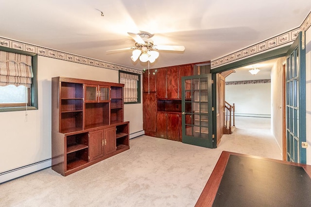 N2594 State Road 76, Hortonville, WI 54944 - unfurnished living room featuring a baseboard heating unit, a ceiling fan, carpet floors, and a baseboard radiator