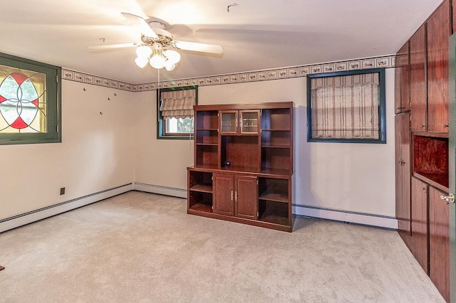 N2594 State Road 76, Hortonville, WI 54944 - unfurnished bedroom with baseboard heating, carpet floors, and a ceiling fan