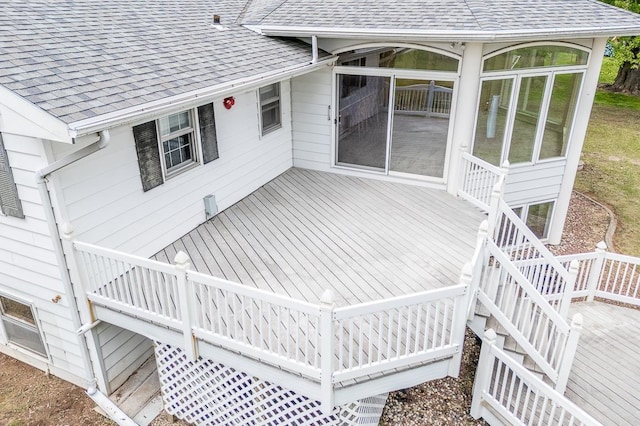 N2594 State Road 76, Hortonville, WI 54944 - wooden deck featuring stairs and a sunroom