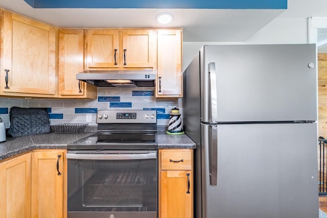 201 N 3rd St, Colby, WI 54421 - kitchen featuring appliances with stainless steel finishes, under cabinet range hood, dark countertops, and light brown cabinetry