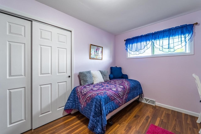 201 N 3rd St, Colby, WI 54421 - bedroom with wood finished floors, baseboards, and a closet