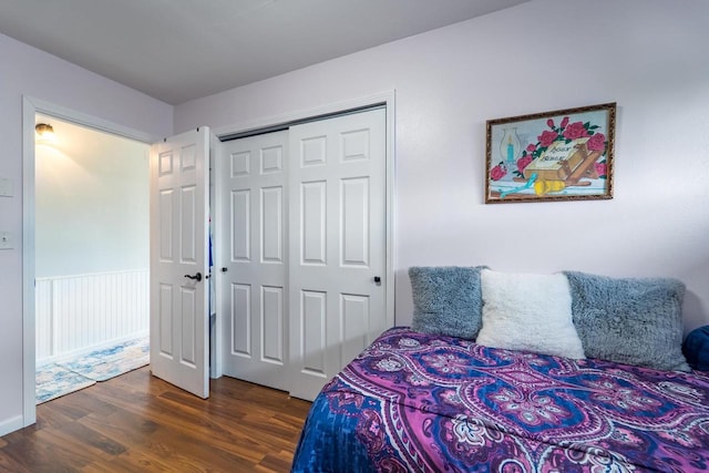 201 N 3rd St, Colby, WI 54421 - bedroom featuring dark wood finished floors and a closet