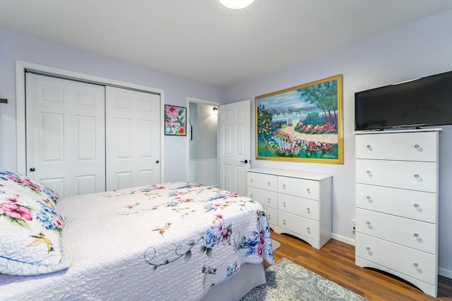 201 N 3rd St, Colby, WI 54421 - bedroom featuring wood finished floors, a closet, and baseboards