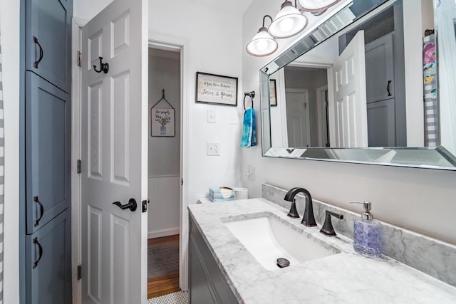 201 N 3rd St, Colby, WI 54421 - bathroom with vanity and wood finished floors