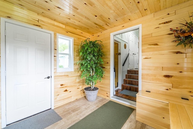 201 N 3rd St, Colby, WI 54421 - foyer entrance with wooden walls, wood finished floors, and stairway