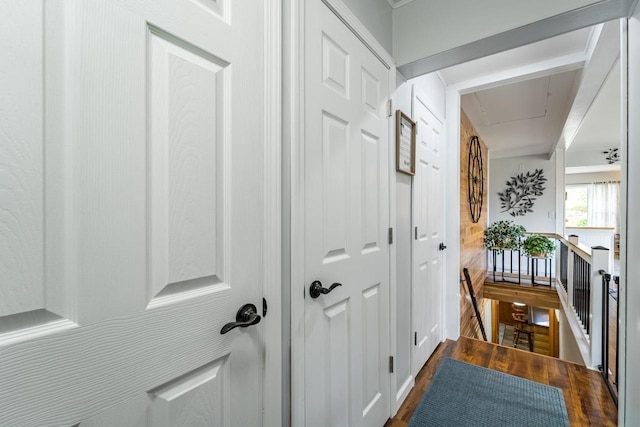 201 N 3rd St, Colby, WI 54421 - hall featuring attic access, an upstairs landing, and dark wood-style flooring