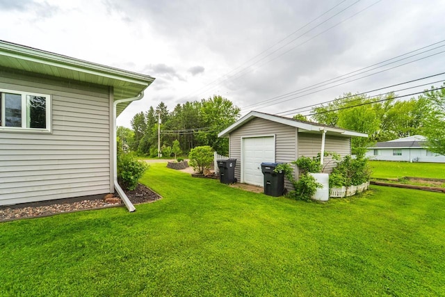 201 N 3rd St, Colby, WI 54421 - view of grassy yard featuring an outbuilding and a detached garage
