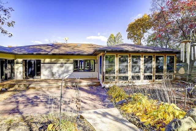 508 Frost Woods Rd, Monona, WI 53716 - rear view of house featuring a sunroom