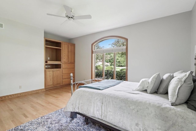 W313N4961 Chapel Ridge Rd, Hartland, WI 53029 - bedroom with light wood-style floors, a ceiling fan, and baseboards
