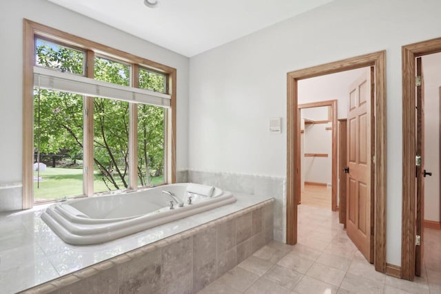 W313N4961 Chapel Ridge Rd, Hartland, WI 53029 - bathroom featuring a garden tub and tile patterned flooring