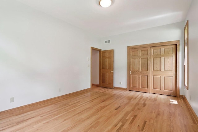 W313N4961 Chapel Ridge Rd, Hartland, WI 53029 - unfurnished bedroom with light wood finished floors