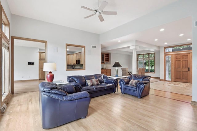 W313N4961 Chapel Ridge Rd, Hartland, WI 53029 - living area with decorative columns, light wood-type flooring, a ceiling fan, recessed lighting, and baseboards