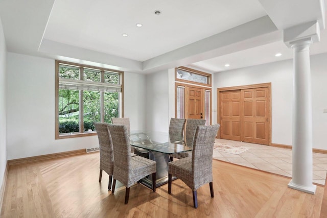 W313N4961 Chapel Ridge Rd, Hartland, WI 53029 - dining area with decorative columns, baseboards, recessed lighting, light wood-style flooring, and a raised ceiling