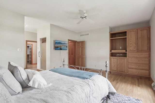 W313N4961 Chapel Ridge Rd, Hartland, WI 53029 - bedroom with light wood finished floors and ceiling fan