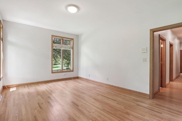 W313N4961 Chapel Ridge Rd, Hartland, WI 53029 - unfurnished room with light wood-style flooring and baseboards