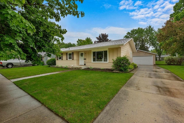 116 Woodward St, Fond Du Lac, WI 54935 - ranch-style house with a front lawn, a garage, and board and batten siding