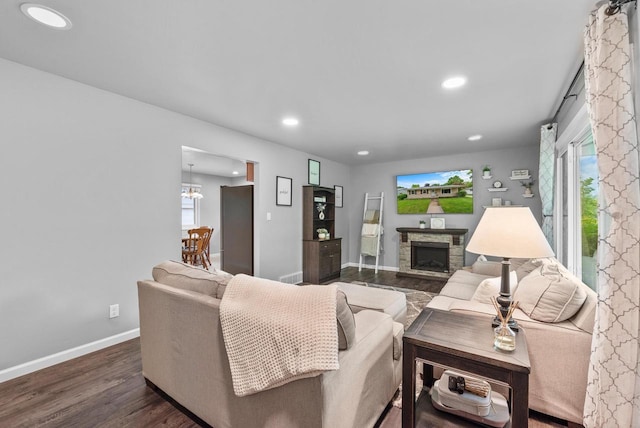 116 Woodward St, Fond Du Lac, WI 54935 - living area featuring recessed lighting, wood finished floors, a fireplace, and baseboards