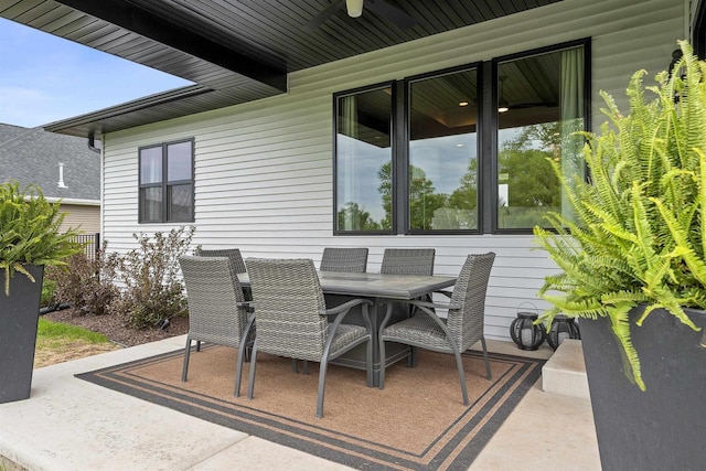 3812 Hawk Ledge Cir, De Pere, WI 54115 - view of patio featuring outdoor dining area and a ceiling fan