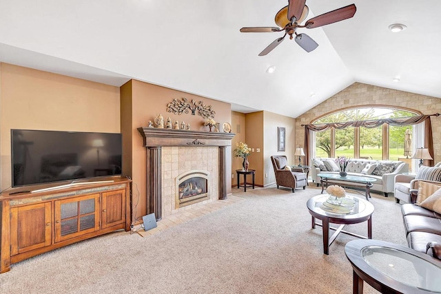 5125 Finger Rd, Green Bay, WI 54311 - living room with lofted ceiling, light colored carpet, a ceiling fan, a tile fireplace, and baseboards