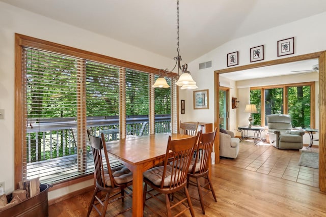 16625 Tanglewood Dr, Brookfield, WI 53005 - dining space featuring lofted ceiling and light wood-style flooring