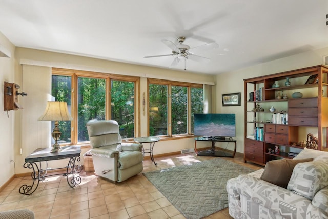 16625 Tanglewood Dr, Brookfield, WI 53005 - living area with plenty of natural light, a ceiling fan, and baseboards